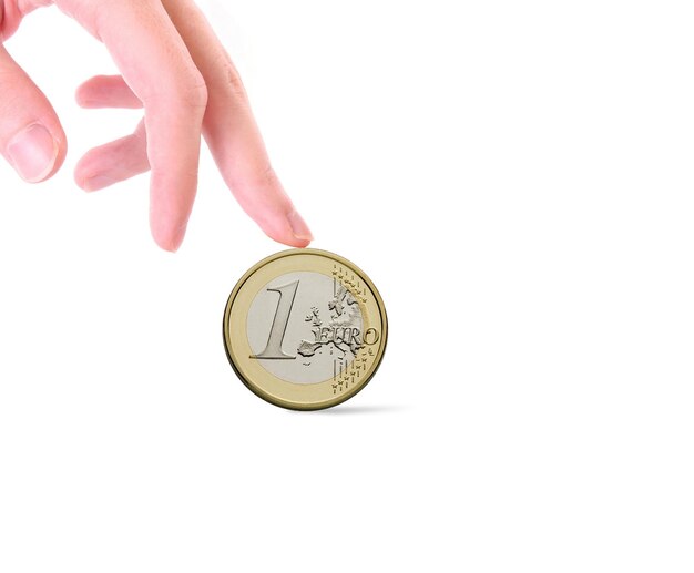 Uma imagem isolada de Euro Coin em uma mão