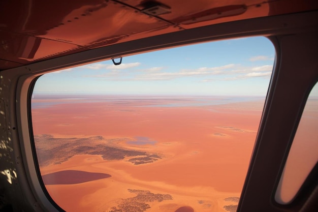 Foto uma janela de um avião com as palavras um deserto no lado