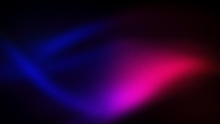 Foto uma mistura dinâmica de tons rosa azul profundo e vermelho com uma textura granulada criando um fundo abstrato ousado perfeito para banners, papéis de parede e projetos