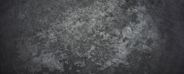 Uma parede de concreto cinza com um padrão de pequenas flores.