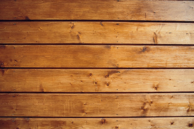 Uma parede de prancha de madeira marrom textura de fundo