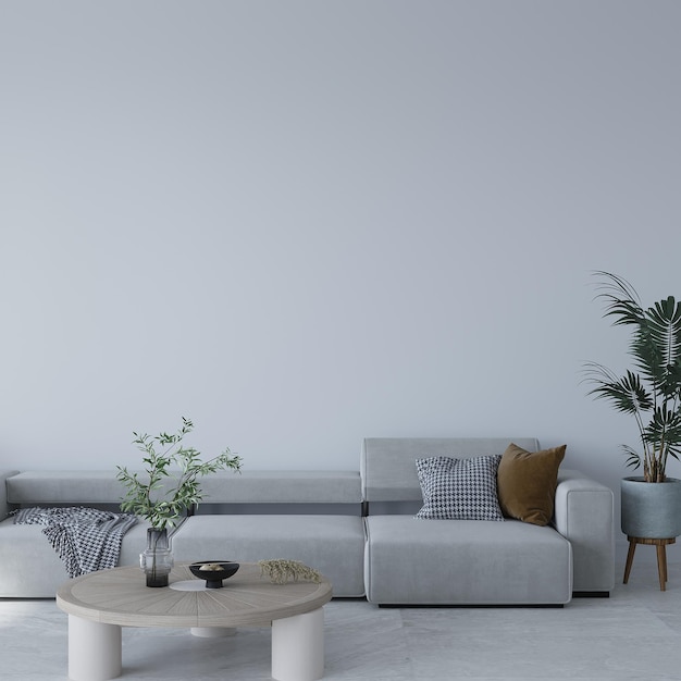 Uma sala de estar com sofá, mesa de centro e uma planta sobre a mesa.