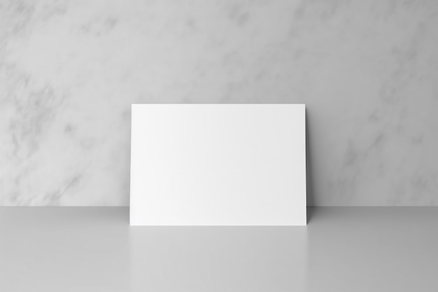 Foto uma tela branca em branco repousa sobre um piso de mármore branco.
