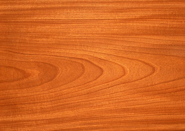uma textura de madeira castanha com um desenho em espiral