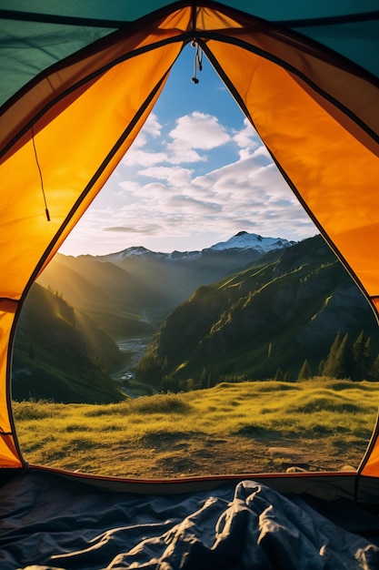 uma vista de uma tenda para montanhas e um vale