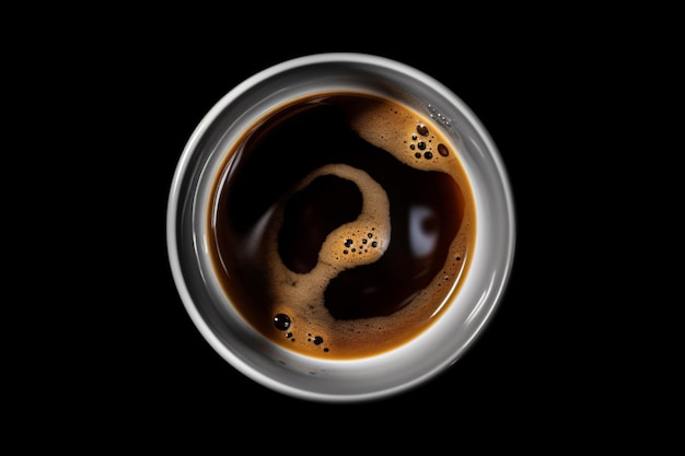 uma xícara de café com fundo preto