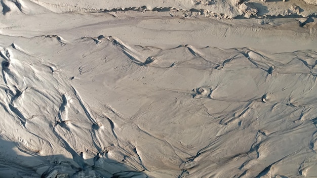 Undeutliches Bild des Sandmusters Abstrakter Naturhintergrund