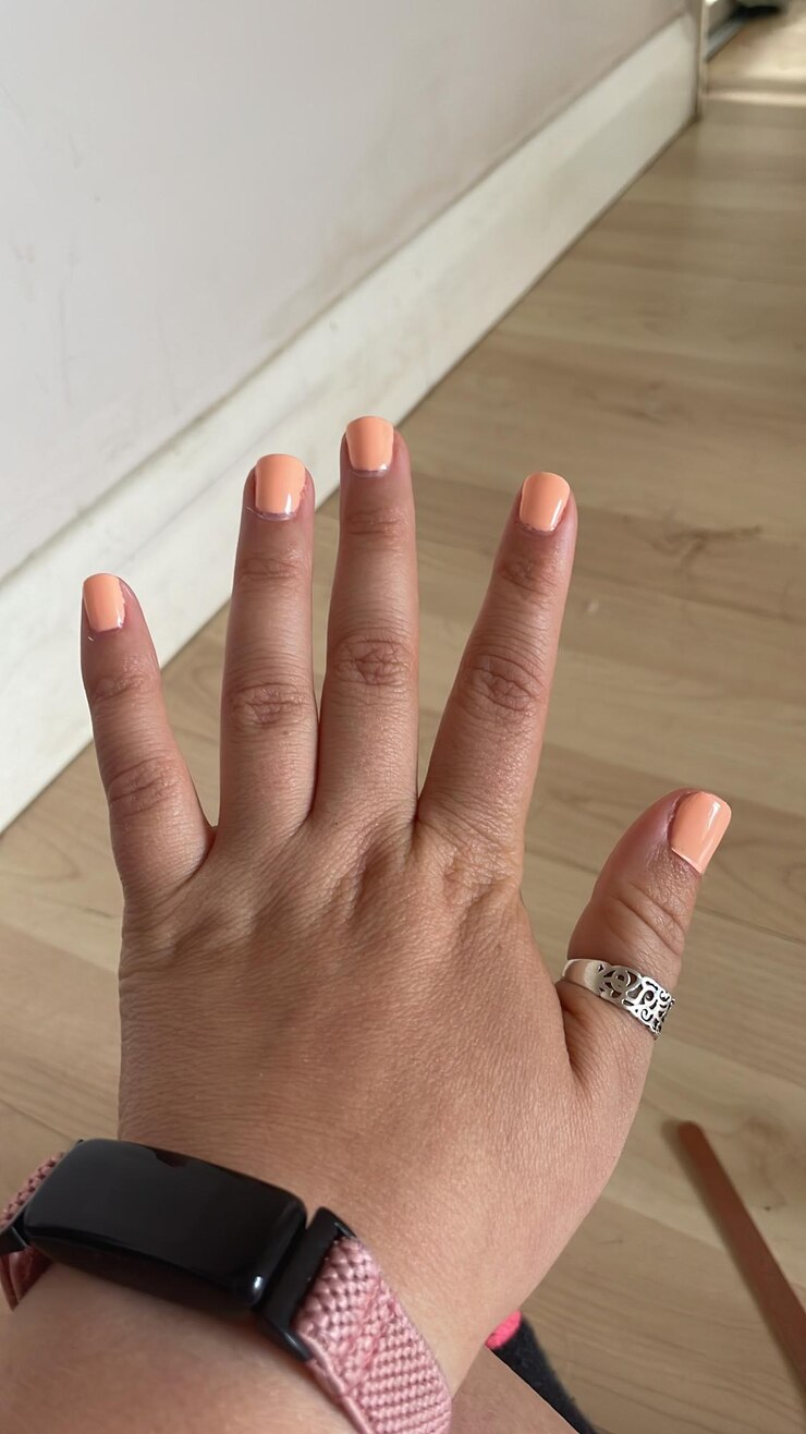 Foto unhas laranjas
