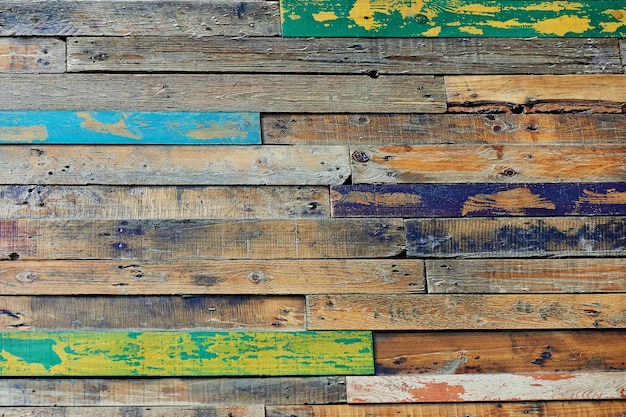 Unidades de textura Valla de madera multicolor o piso formado por madera pintada en colores alegres