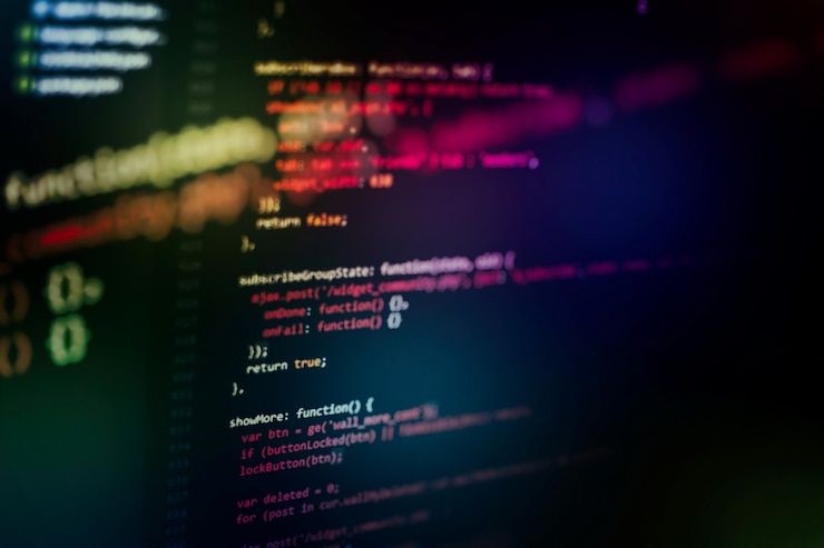 Foto uso de css, javascript y html. supervisar el primer plano del código fuente de la función. fondo abstracto de tecnología de ti. código fuente del software.