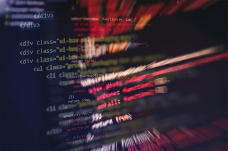Foto uso de css, javascript y html. supervisar el primer plano del código fuente de la función. fondo abstracto de tecnología de ti. código fuente del software.