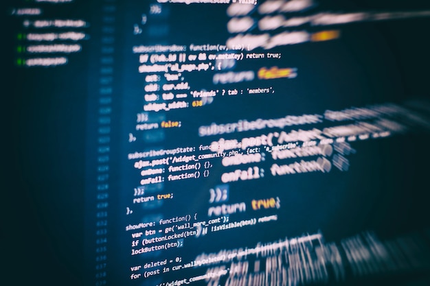 Uso de CSS, JavaScript y HTML. Supervisar el primer plano del código fuente de la función. Fondo abstracto de tecnología de TI. Código fuente del software.