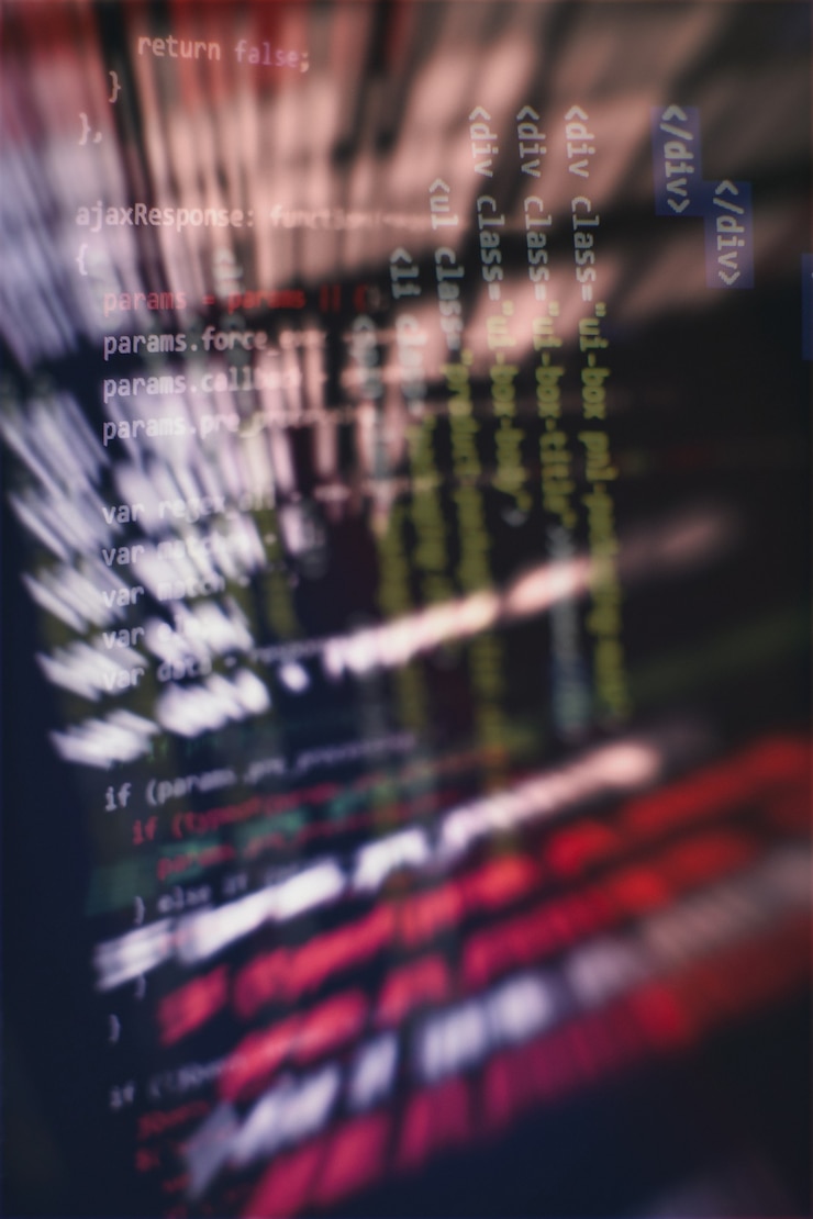 Foto uso de css, javascript y html. supervisar el primer plano del código fuente de la función. fondo abstracto de tecnología de ti. código fuente del software.