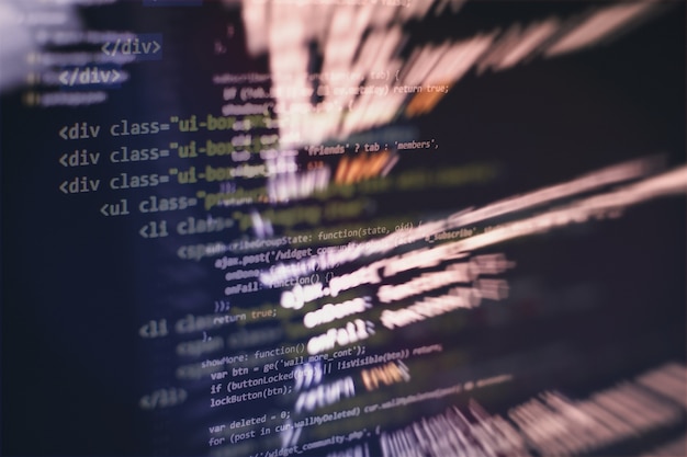 Uso de CSS, JavaScript e HTML. Monitore o close up do código-fonte da função. Abstrato base de tecnologia de TI. Código-fonte do software.