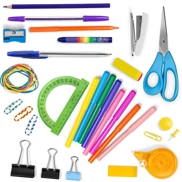 Útiles escolares coloridos en el fondo
