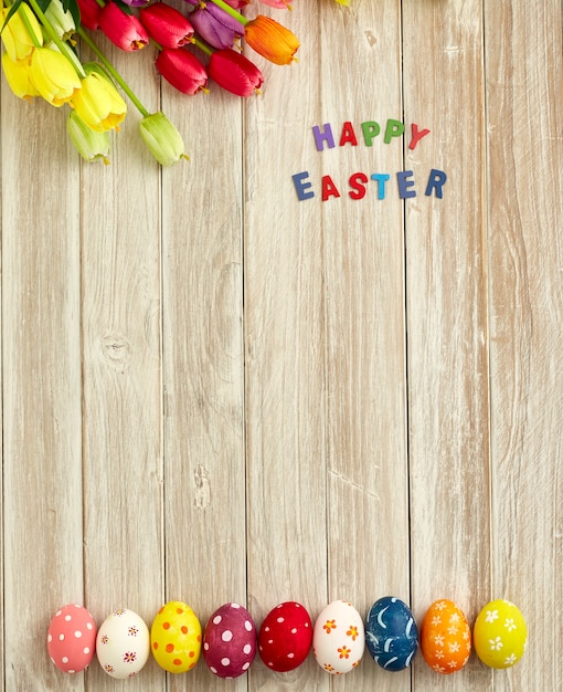 Foto vacaciones de pascua en madera blanca