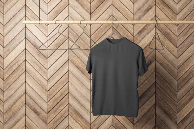 Vacíe una camiseta negra en la percha Fondo de pared de azulejos de madera Tienda de diseño y concepto de estilo Mock up 3D Rendering