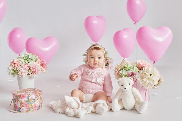 Valentinstag Baby Mädchen Valentinstag Bälle und Blumen Feier Muttertagspostkarte Internationaler Tag des Glücks Geburtstagsfeier