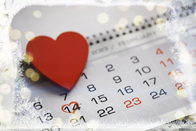 Valentinstag Kalender für mit eingekreistem Datum 14. Februar Schnee Hintergrund Valentinstag Konzept