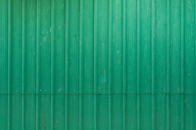 Valla de chapa ondulada de metal verde para el fondo