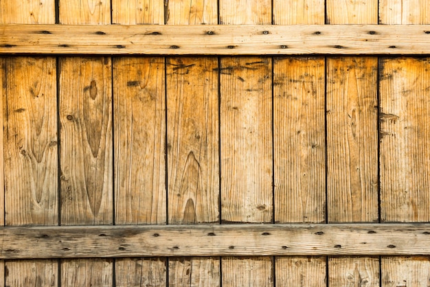 Foto valla de madera vieja oscura de tablones de madera para textura y fondo