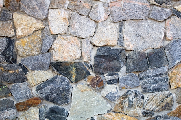 Valla de piedra ornamental, ray background estilizada en una piedra natural salvaje