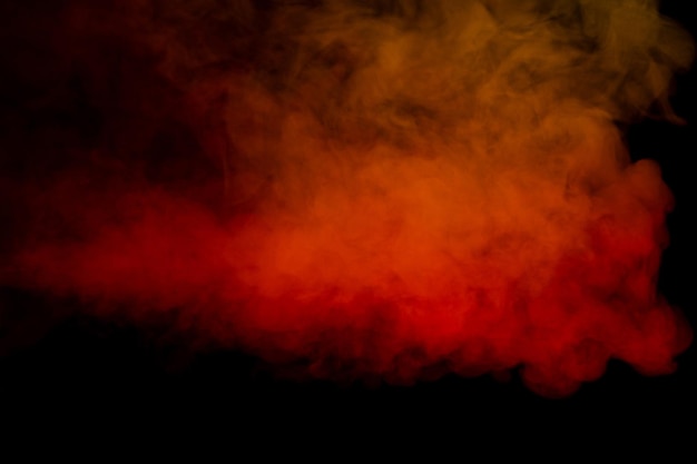 Vapor naranja y rojo sobre un fondo negro