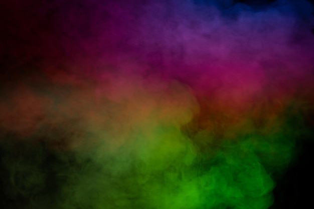 Vapor verde y blanco sobre un fondo negro