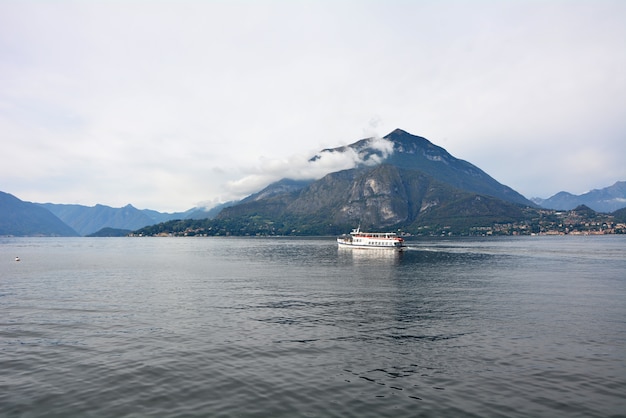 Varenna town Italia como lake harbor boats