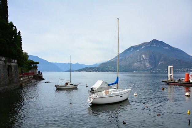 Varenna town Italia como lake harbor boats