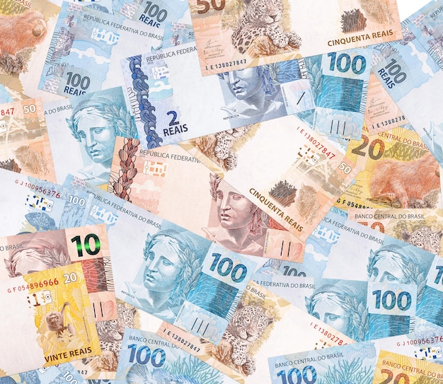 Foto varios billetes de dinero de brasil billetes reales en textura y fondo