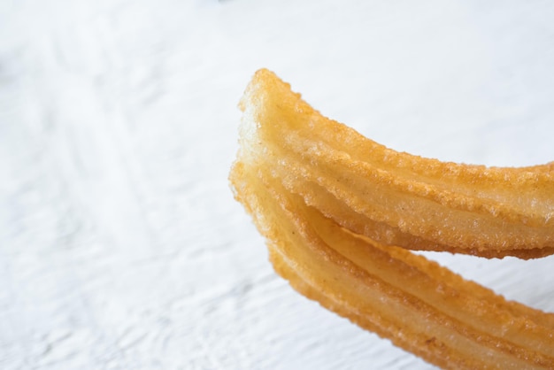 Vários churros típicos churros espanhóis são feitos com farinha, água, sal e churreria preparada com óleo