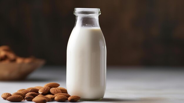 Un vaso de leche con almendras y galletas.