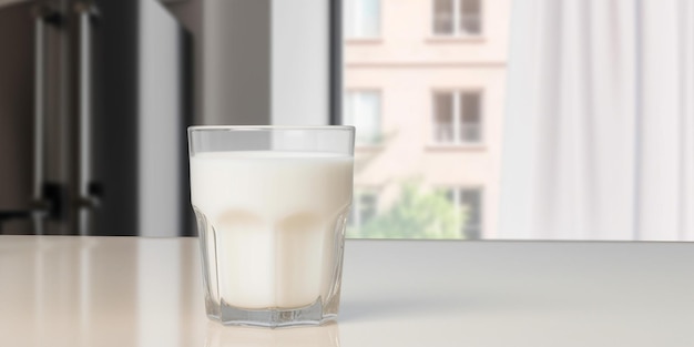 Un vaso de leche se sienta en una mesa frente a una ventana.