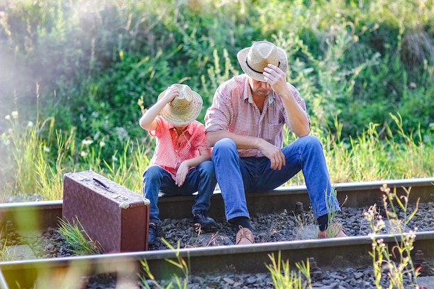 Vater und Sohn Cowboys Konzept Glück zusammen