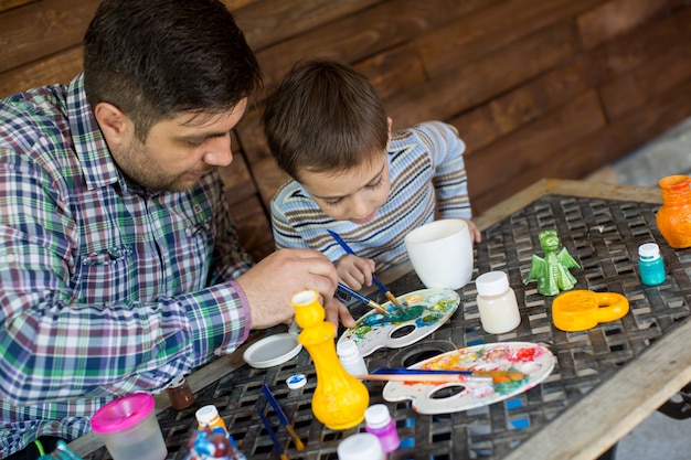 Foto vater und sohn pinsel