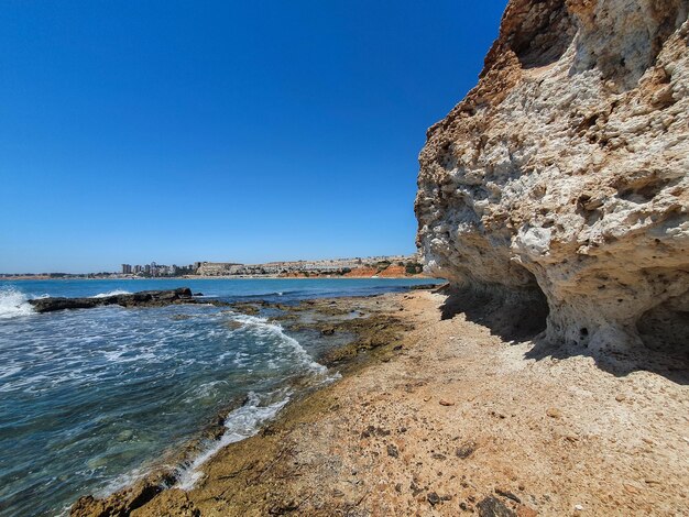 Foto vega baja del segura - orihuela costa -paisajes junto al mar entre cabo roig y campoamor agua marina