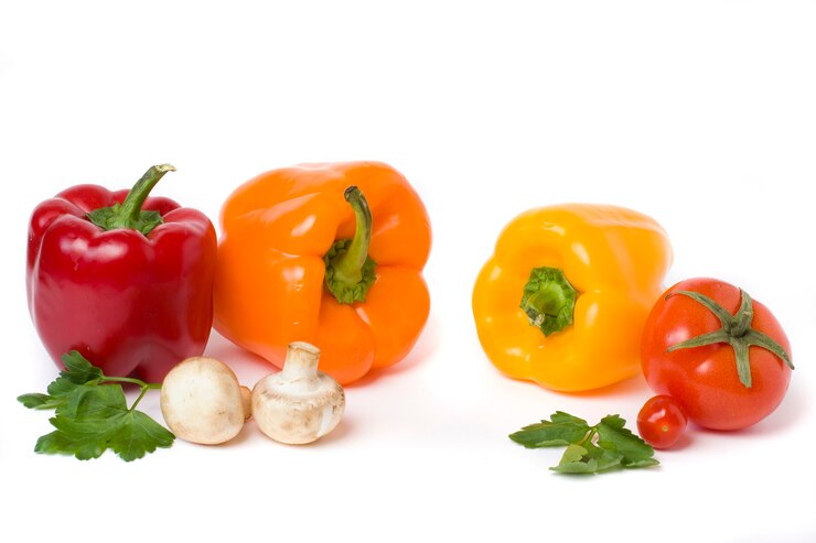 Vegetais multicoloridos em um fundo branco