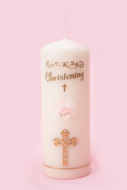 Vela de batismo com detalhes cor de rosa