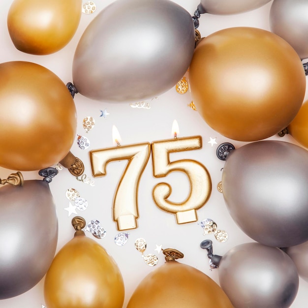 Vela de festa de aniversário número 75 com balões de ouro e prata
