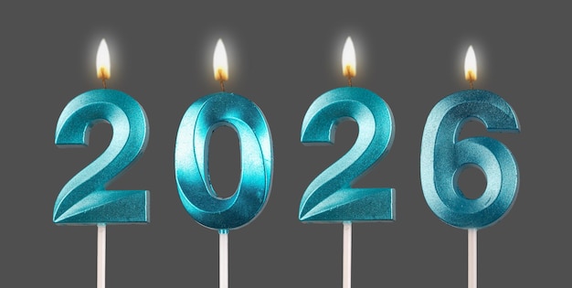 Velas en forma de número de año nuevo 2026 con luz