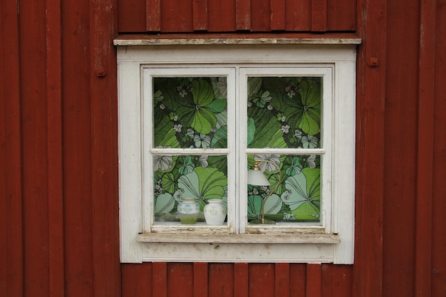 Foto ventana en un antiguo edificio de madera