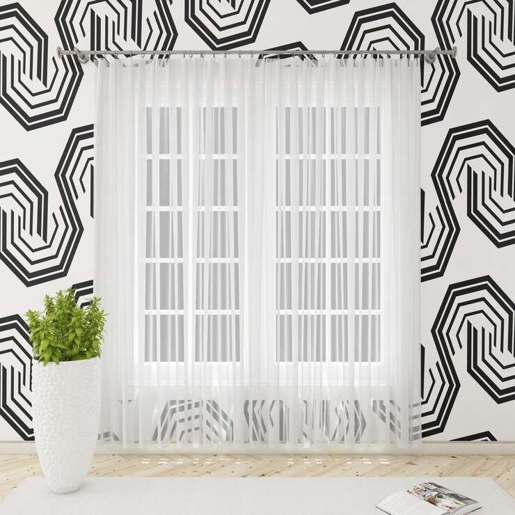 una ventana blanca con una planta en el umbral de la ventana