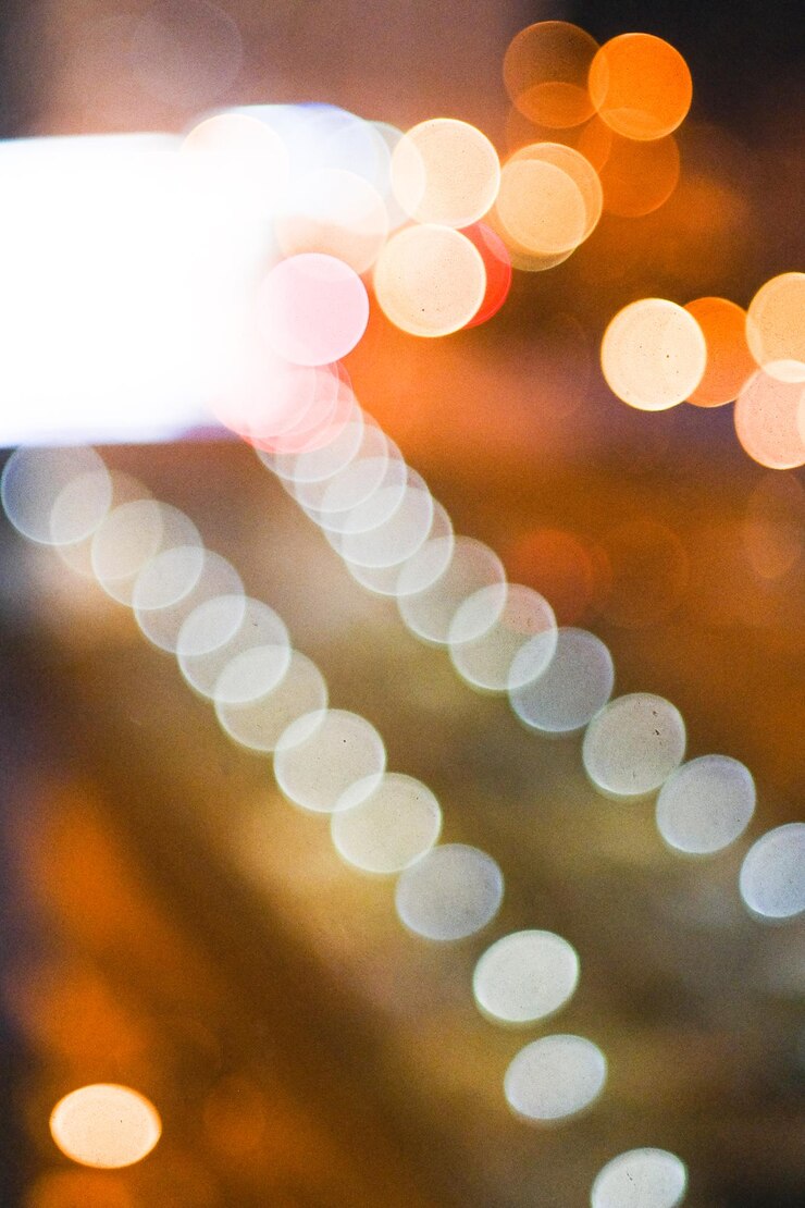 Foto ventana a la ciudad nocturna bokeh fondo de enfoque borroso
