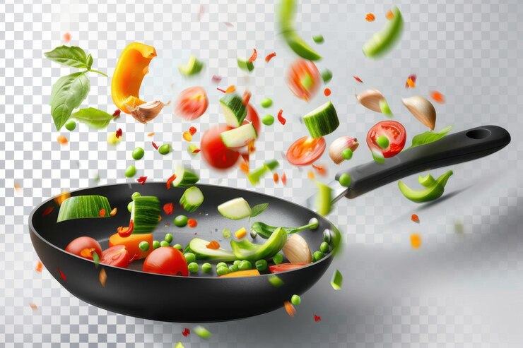 Las verduras coloridas, incluidos los tomates, el brócoli y los guisantes, flotan sobre una sartén creando una vibrante escena de cocina