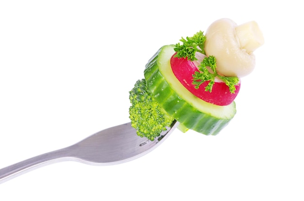 Verduras en un tenedor