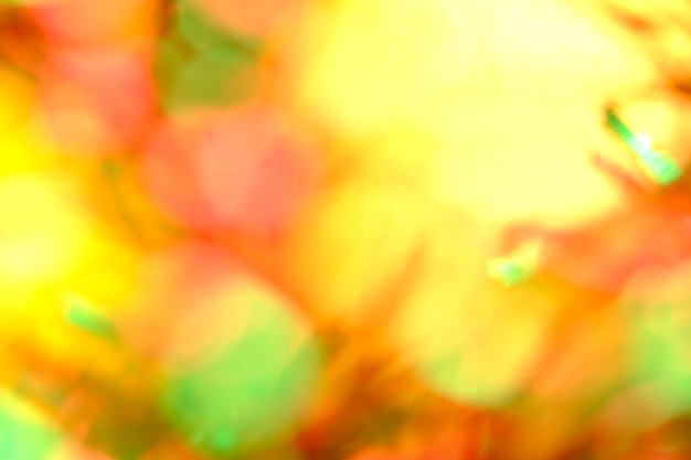 Verschwommener Bokeh-Weihnachtsthema-Hintergrund. Bunte abstrakte Weihnachtsbeleuchtung. Weihnachtskonzept.