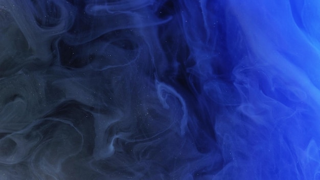 Verschwommener Nebel Farbe Wasserpritzung defokusierte blaue Farbe leuchtende Staubpartikel Textur Nebel schwebend
