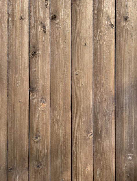 Vertikale Holzbohlen mit Knoten Hölzerner Hintergrund