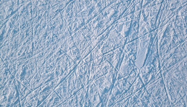 Vestígios de gelo de inverno de patins textura fundo abstrato vista superior fotografia aérea